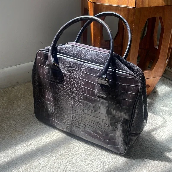 Estée Lauder brown leather purse